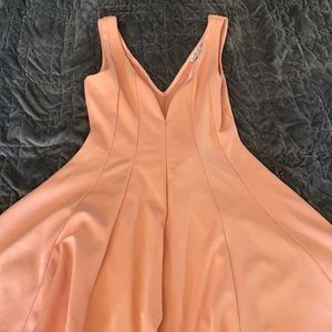 Peach pleated skater dress